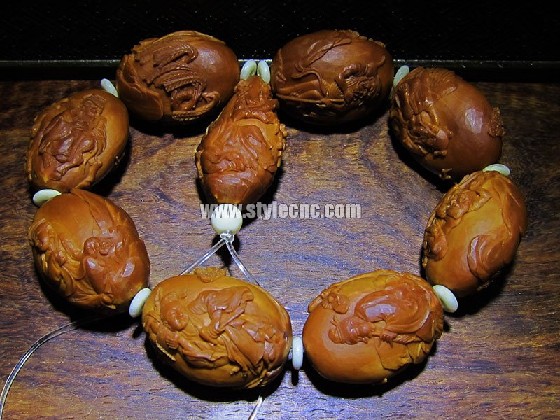 數(shù)控雕刻機(jī)雕刻下橄欖核