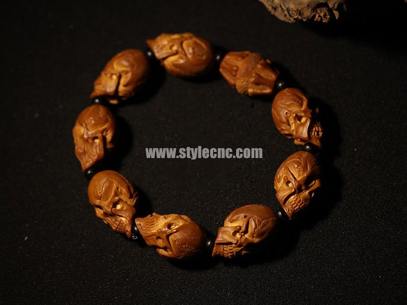 數(shù)控雕刻機(jī)在劣質(zhì)橄欖核上雕刻